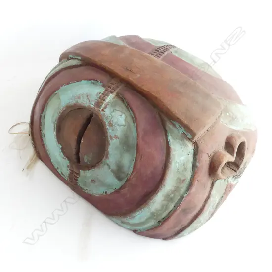 A vintage African tribal carved mask,